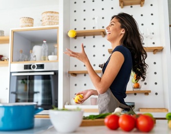 woman cooking in kitchen