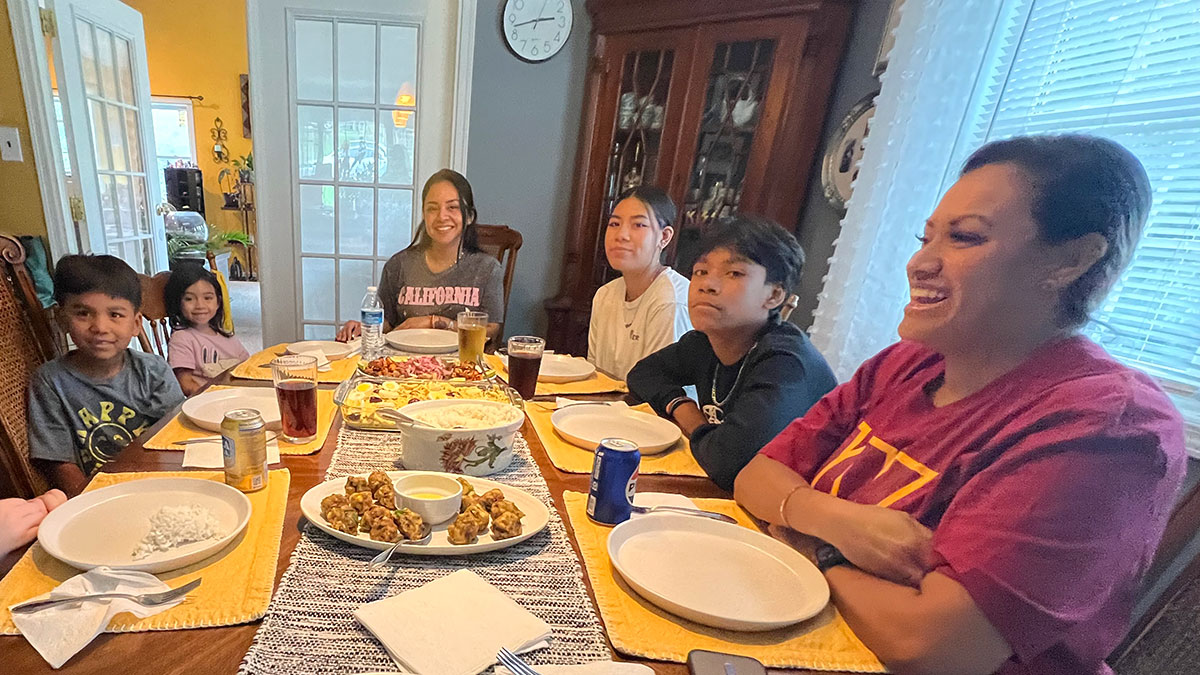 mg-caption:My family around the dinner table - traditions, memories and connection.